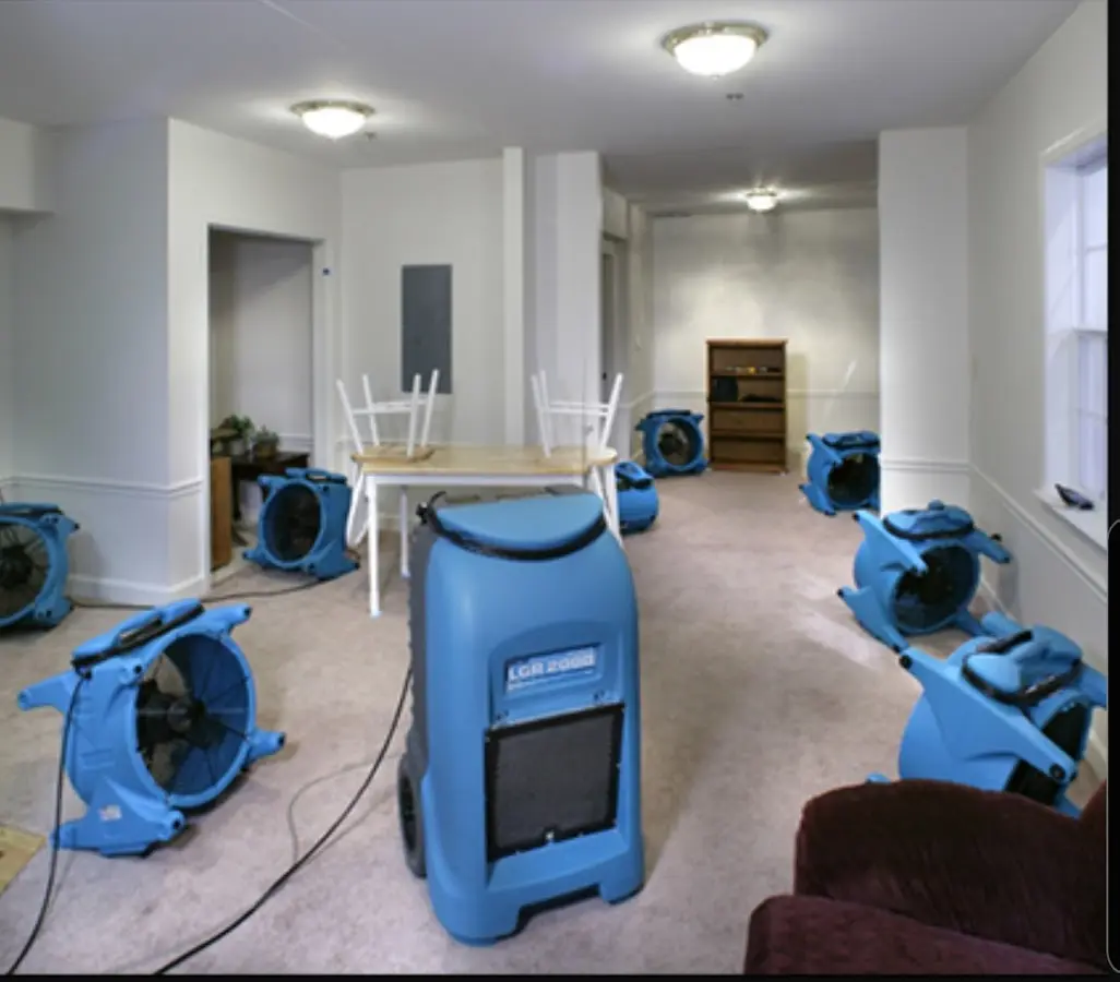 Air movers and dehumidifier setup for Water Damage Restoration in New Baltimore